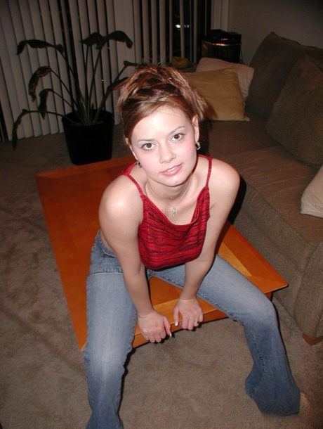 Redhead teen Kelly flaunts sexy feet & sheds jeans to show natural hairy bush
