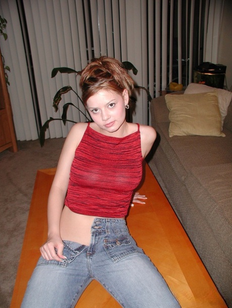 Redhead teen Kelly flaunts sexy feet & sheds jeans to show natural hairy bush