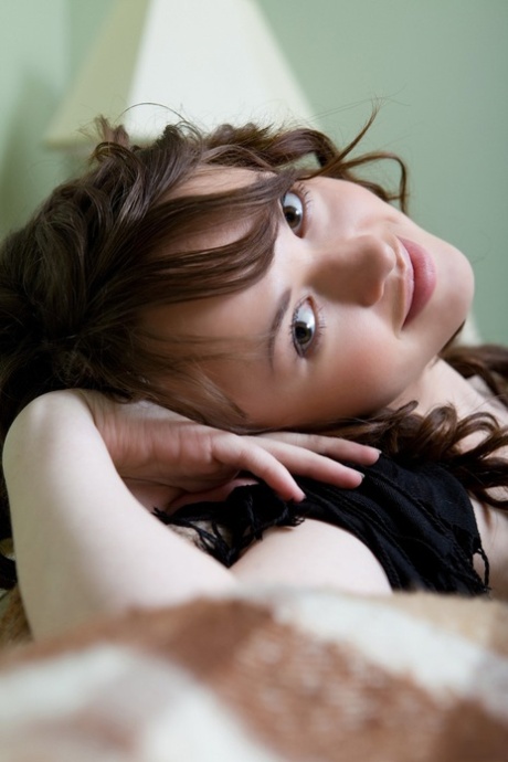 Adorable babe Nastya E displaying her beautiful breasts & her yummy pussy
