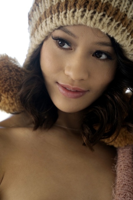 Teen Jasmine Grey reveals her petite body and poses in a winter cap