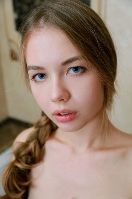 Big titted Russian teen Camilla Stan strips down naked and takes a hot shower