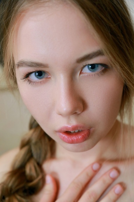 Big titted Russian teen Camilla Stan strips down naked and takes a hot shower