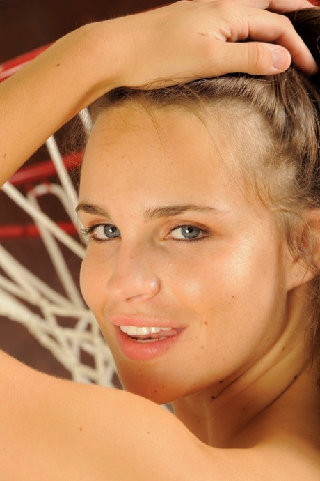 Beautiful brunette Teal Conrad spreads her tight shaved pussy up close