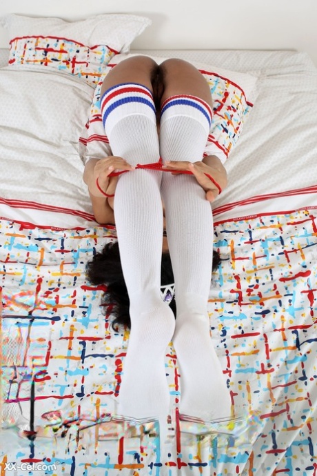 Sexy teen Addisson exposes her giant boobs and poses in high socks