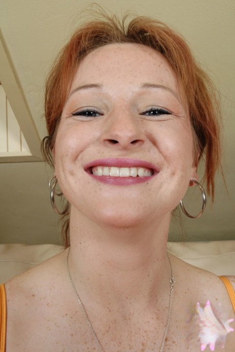 Amateur ginger Mischel showing off her natural tits and pink holes up close