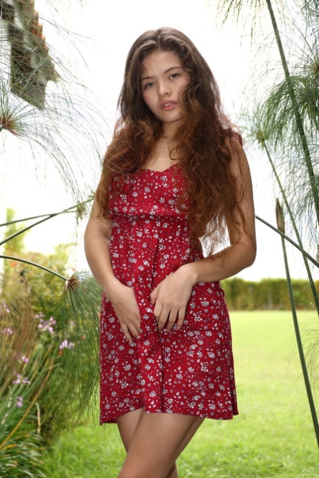 Playful Latina teen Irene Rouse poses naked and in her sexy outfits