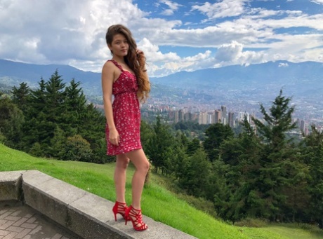 Playful Latina teen Irene Rouse poses naked and in her sexy outfits