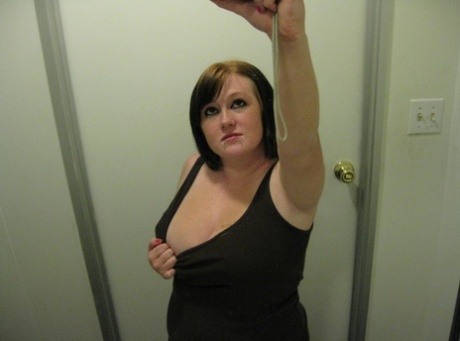 Chubby amateur teen Jessica Claire shows her big tits and poses in the mirror