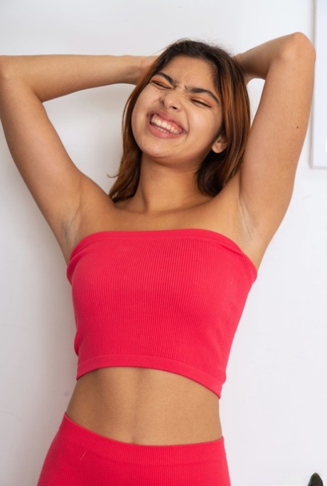Adorable Latina teen Hazel Heart all all fours spreading her big ass cheeks