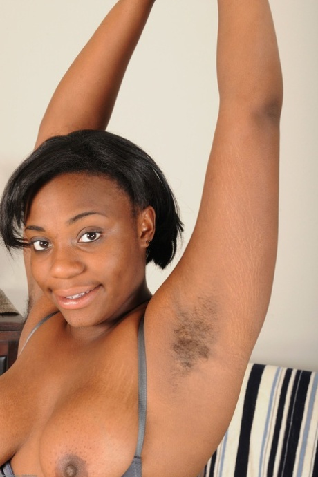 Chubby ebony Lacey shows her hairy armpits and grabs her fat booty