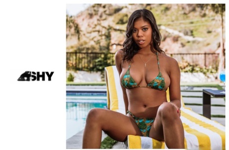 Attractive ebony teen with incredible big tits Nia Nacci gets her ass banged
