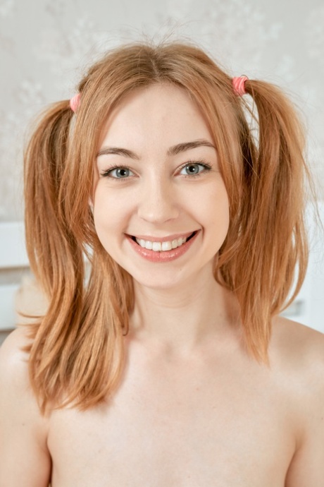 Amateur teen with pigtails Andrea doffs her pink outfit and toys herself