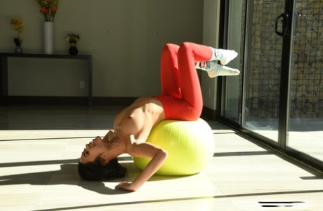 Petite teens in hot tights expose their nice bodies and pose on yoga mats