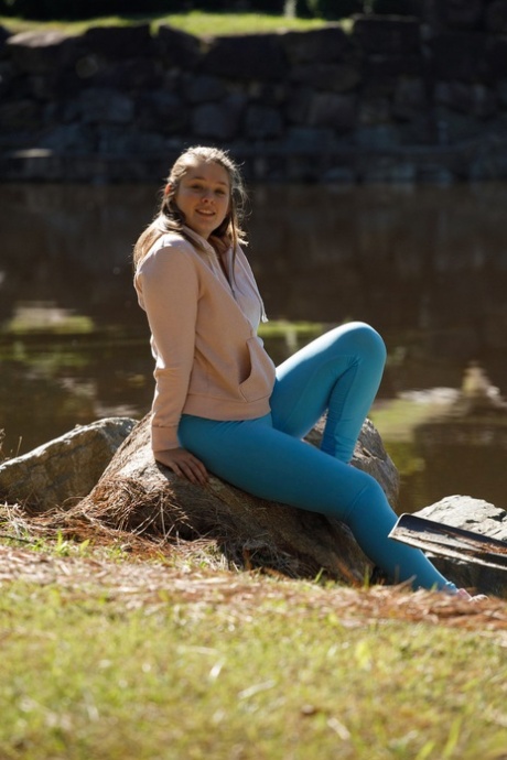 Chubby amateur Fawn Richfield teases nude with her small tits outdoors