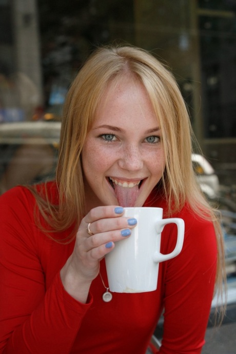 Blonde beauty Rune Kimele posing & flashing her big booty in public
