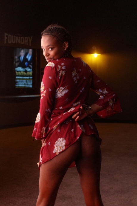 Naughty ebony babe Neda Marie exposes her natural tits & her hot ass in public