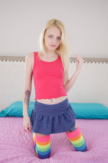 Skinny blonde teen Kate Bloom gets rid of her panties & rubs her beaver