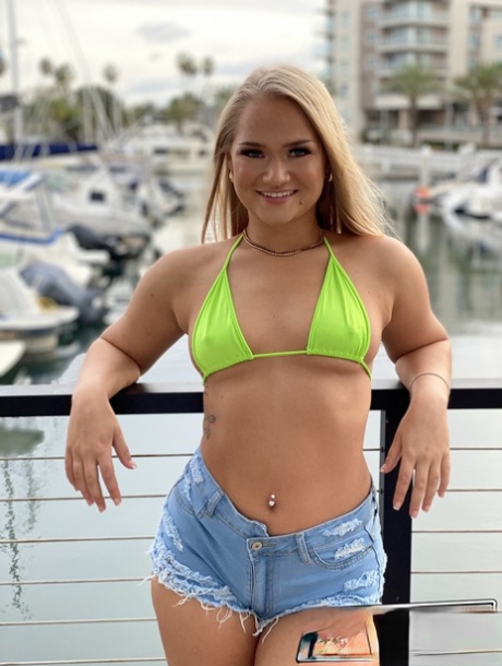 Hot blonde Harley King rides a big dick after teasing in booty shorts outdoors