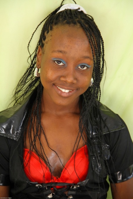 Sexy ebony babe Mistique removes her panties and spreads her hairy pussy
