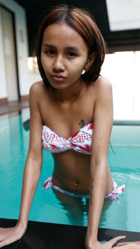 Sweet amateur Asian babe Puy B undresses and gets dicked hard in POV