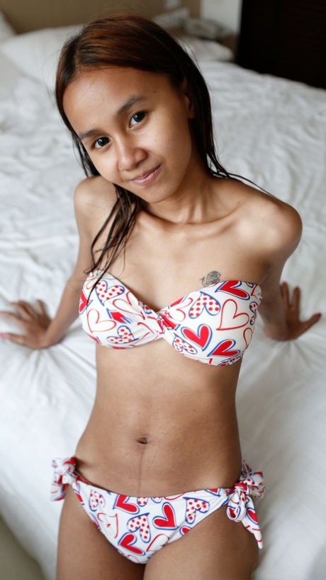 Sweet amateur Asian babe Puy B undresses and gets dicked hard in POV
