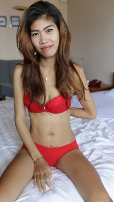 Asian babe Nam C shows off her petite body while stripping for some POV sex