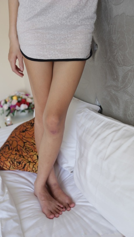 Asian girl Mi shows off her petite body & gives a big dick a POV ride