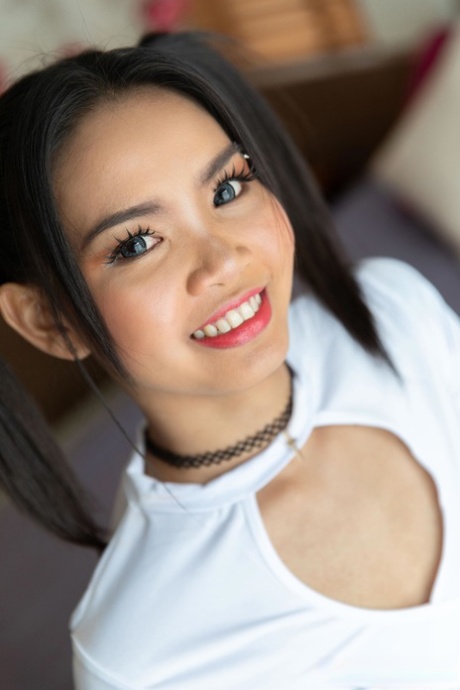 Pigtailed Thai beauty Totti strips to her heels and shows her booty & pussy