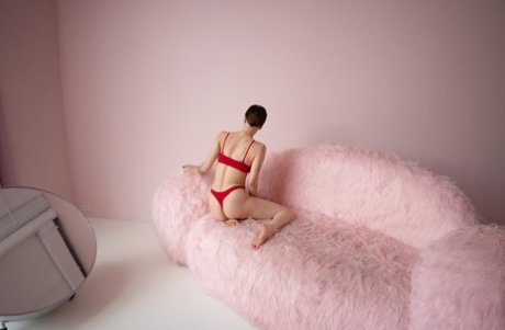 Short haired beauty Valentina flaunts her incredible delicious ass on a chair
