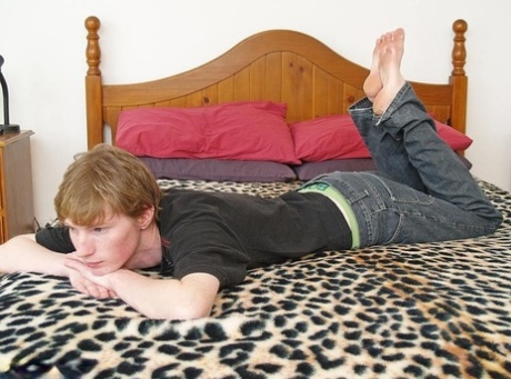 Blonde twink Jackson C displays his big ass & sexy feet before masturbating