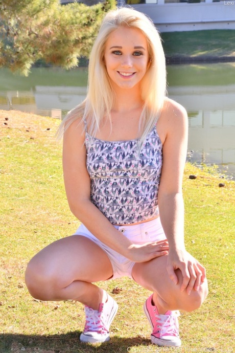 Horny blonde babe Lexi fingers her snatch and toys her tight booty in a solo