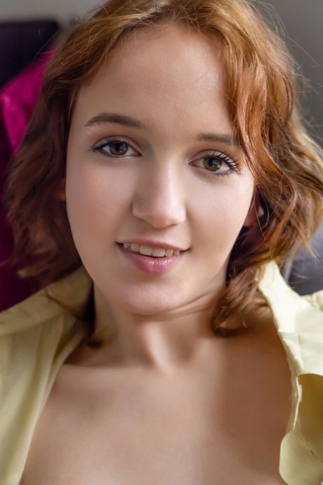 Sweet curvy teen Rokki shows off her fabulous big tits and shaved muff