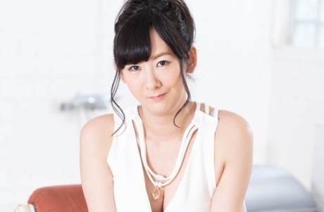 Asian masseuse Minori Koike enjoys hardcore sex after giving a blowjob