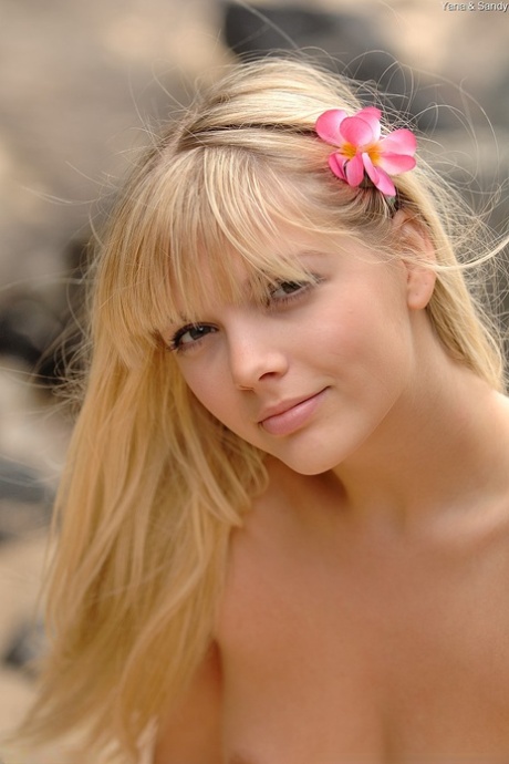 Cute blondes Sandy and Yana flaunt their titties while riding a strapon
