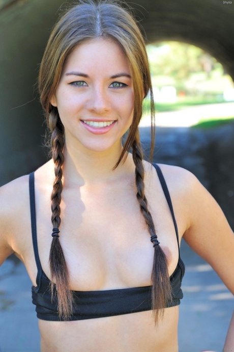 Gorgeous blue-eyed teen with adorable tits Shyla reveals her body in public